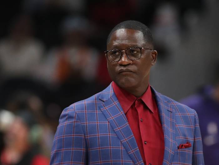 Dominique Wilkins looks on during a game.